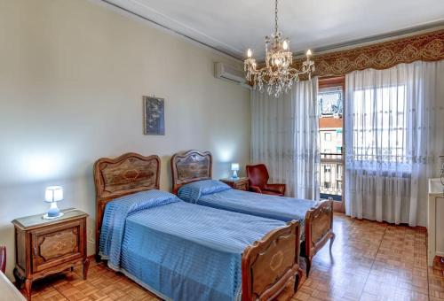 Кровать или кровати в номере Attico storico