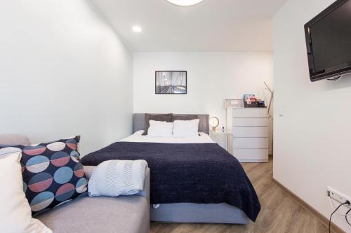 Postel nebo postele na pokoji v ubytování Nordic design apartment