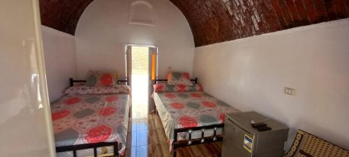 Postel nebo postele na pokoji v ubytování Casablanca Guest House