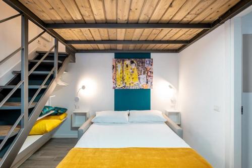 A bed or beds in a room at Casa Trastè