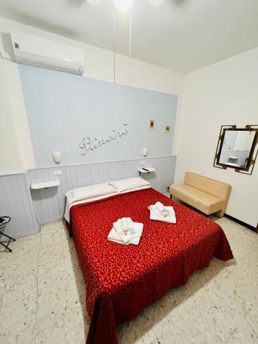 Ένα ή περισσότερα κρεβάτια σε δωμάτιο στο Hotel Principe