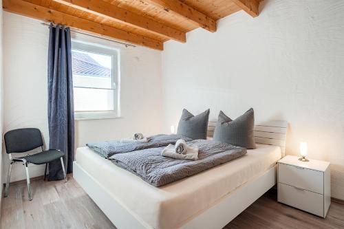 Postel nebo postele na pokoji v ubytování Nr 14 Seepferdchen