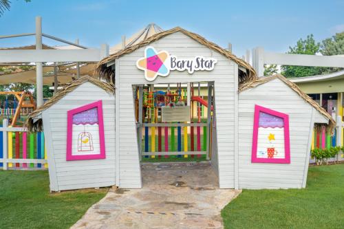 a white play set with a toy store at Lara Barut Collection-Ultra All Inclusive in Lara