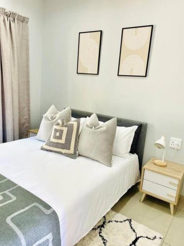 Ένα ή περισσότερα κρεβάτια σε δωμάτιο στο Trendy, Comfortable 1 bedroom Apartments in Mthatha