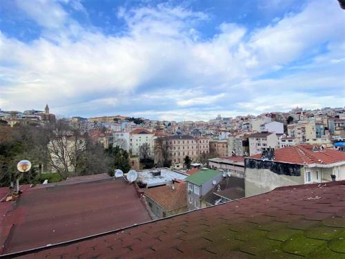 a view of a city from the roof of a building at Jazzy Homes - Modern & Stylish Flat - Bosphorus View, Terrace in Istanbul