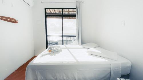 Cama o camas en una habitación en Beautiful Mansion con vistas a la bahía y jacuzzi - Old Town Salvador
