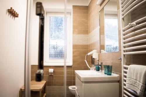 Salle de bains dans l'établissement Rodinný resort UKO