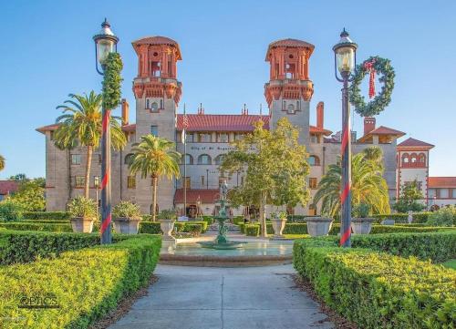 a large building with two towers on top of it at Luxurious indoor/outdoor Family Paradise in downtown St Augustine in Saint Augustine