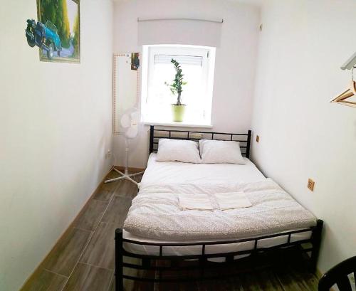 Cama o camas de una habitación en Smart Mini Hotel