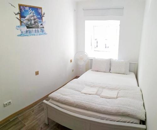 Cama o camas de una habitación en Smart Mini Hotel