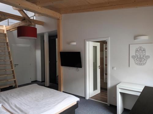 Un ou plusieurs lits dans un hébergement de l'établissement Rodinný resort UKO
