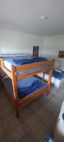 Postel nebo postele na pokoji v ubytování Recanto dos Machados