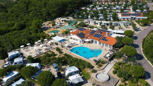 an aerial view of a resort with a swimming pool at Easyatent Luxe Safari tent Krk in Krk