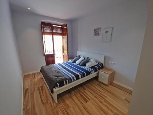 A bed or beds in a room at Piso Allada 1 Ref 1195