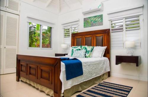 Säng eller sängar i ett rum på Villas the Palms Richmond