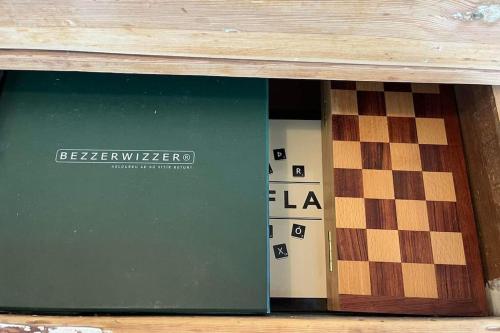 a room with a chess board and a door at Óspaksstaðir- New Renovated Farm in Hrútafjörður in Staður