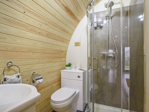 a bathroom with a shower and a toilet and a sink at Coton - Ukc5324 in East Haddon