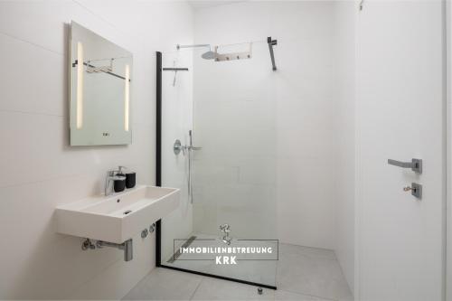 Koupelna v ubytování Penthouse Seaview Emilia