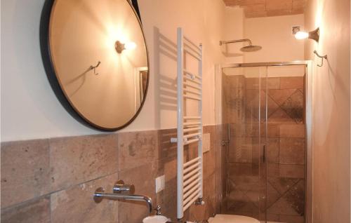 a bathroom with a mirror and a shower at Awesome Apartment In Avigliano Umbro With 2 Bedrooms And Wifi in Avigliano
