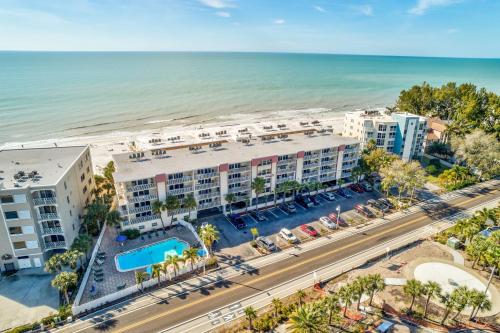 an aerial view of the beach and the ocean at Beach Oasis - Beautifully Remodeled Beachside Condo at Holiday Villas II with Heated Pool! in Clearwater Beach