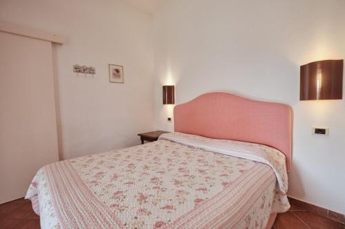 Postel nebo postele na pokoji v ubytování Agriturismo Pavone