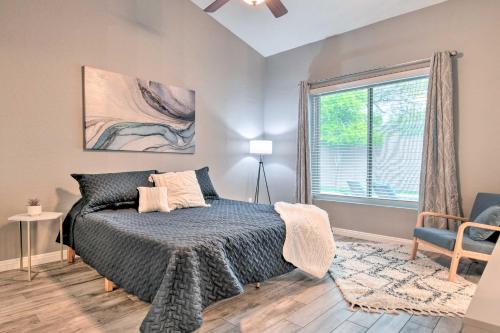 a bedroom with a bed and a window at Private Pool and Community Perks Mesa Home! in Mesa