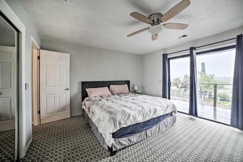 a bedroom with a bed and a ceiling fan at Pet-Friendly Hollister Getaway with Grill! in Hollister
