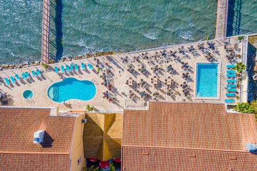 an aerial view of a resort with a swimming pool at Beso del Sol Resort in Dunedin - Perfect Location & Relaxation! in Dunedin