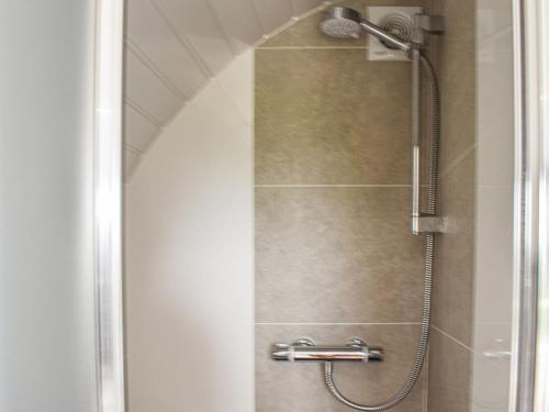 a shower with a glass door in a bathroom at Shiel - Uk39866 in Salen