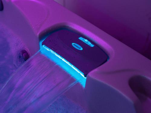 a purple and blue light is on a object at Life Hotel Seaview & Spa in Porto Recanati