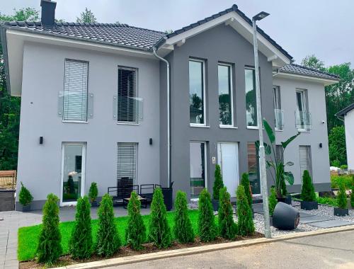 Zahrada ubytování Better Living - Villa - Exklusiv Studio 76qm