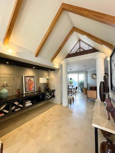 a large room with a living room and a dining room at Piece of Paradise in the city in Guadalajara
