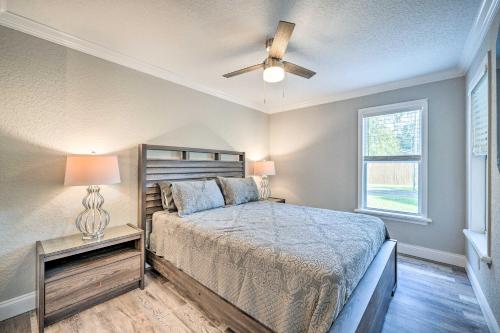 a bedroom with a bed and a ceiling fan at Apopka Home with Yard and Grill Near Wekiwa Springs! in Apopka