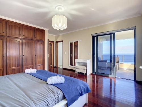 Ένα ή περισσότερα κρεβάτια σε δωμάτιο στο Dream House by Atlantic Holiday