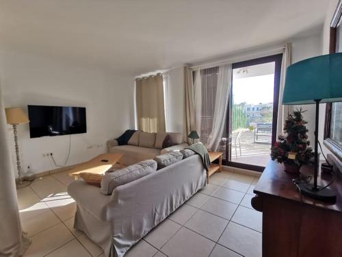Televisyen dan/atau pusat hiburan di Casa Apartamento Mojácar Macenashome