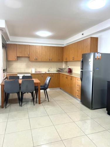 Kuchyň nebo kuchyňský kout v ubytování King David Apartment