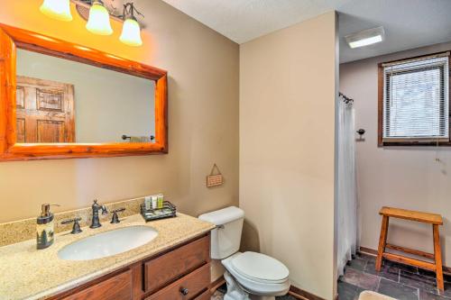 Un baño de Lakefront Roscommon Home with Game Room and Dock!