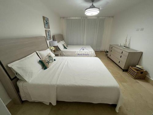 Een bed of bedden in een kamer bij Exclusiva villa vacacional