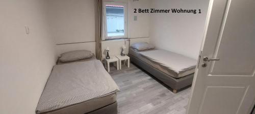 Ένα ή περισσότερα κρεβάτια σε δωμάτιο στο KiRoom Willsbach