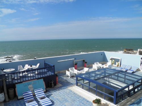 a view of the ocean from the roof of a building at La Maison des Artistes in Essaouira