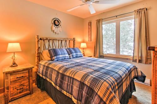 a bedroom with a bed and a window at Drake Home on Big Thompson River - 3 Mi to Estes! in Estes Park