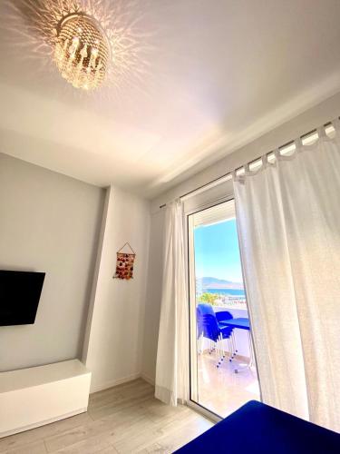 TV a/nebo společenská místnost v ubytování Hard Rock Apartments