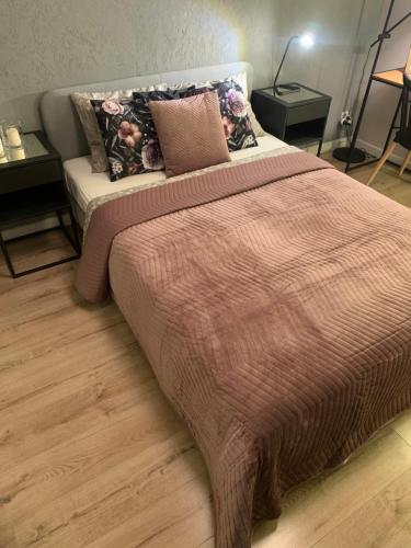 Posteľ alebo postele v izbe v ubytovaní Moderno Apartament