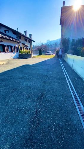an empty street in front of a building at Villa di Charme in Gignod