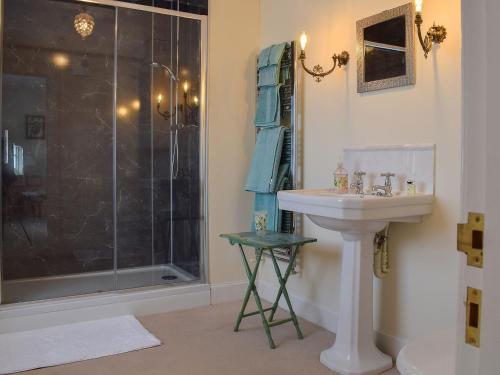 a bathroom with a sink and a shower at Easter Baldinnies in Forteviot