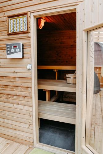 a sauna inside of a wooden house at Rösslgut Bed & Breakfast in Zederhaus