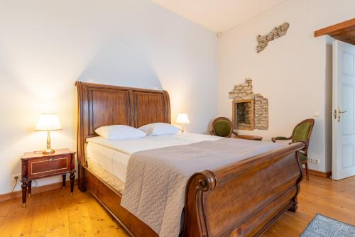 Postel nebo postele na pokoji v ubytování Old Town - Premium Medieval House