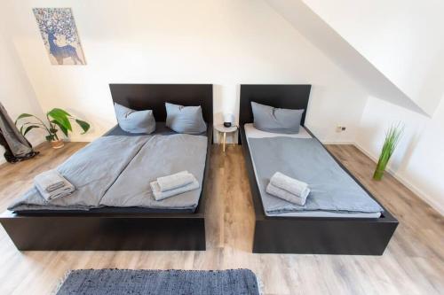 Apartment Chemnitz-Kappel - Perfekt gelegen zwischen Messe und Zentrum tesisinde bir odada yatak veya yataklar