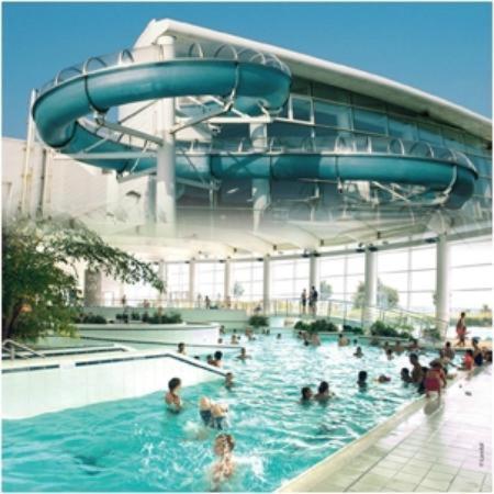 a group of people in a swimming pool at Gîte à deux pas de l'horloge in Senzeille