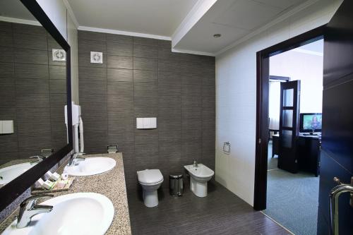 Koupelna v ubytování Hotel Tecadra